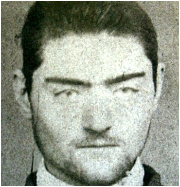 A photograph of a police mugshot of Ned Kelly, aged 16, at the Old Melbourne Gaol